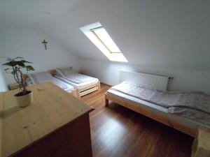 Postel nebo postele na pokoji v ubytování Beck Pince