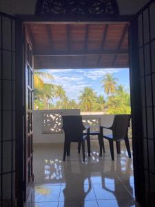 Balkón nebo terasa v ubytování Costa's Villa, Tropical Oasis, Mirissa Balcony Room + 38 fotografií