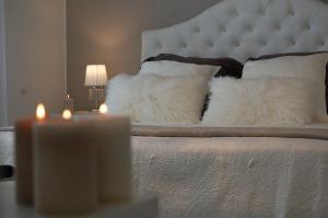Cama ou camas em um quarto em Bellariva Monopoli B&B e Relax
