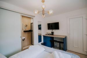 Posteľ alebo postele v izbe v ubytovaní Maison de Luxe