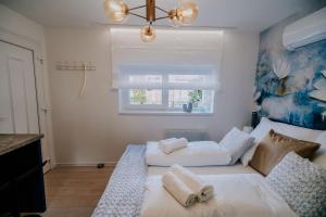 Posteľ alebo postele v izbe v ubytovaní Maison de Luxe