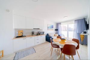 Kuchyň nebo kuchyňský kout v ubytování APARTAMENT PRZY WYDMIE