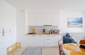 Kuchyň nebo kuchyňský kout v ubytování APARTAMENT PRZY WYDMIE