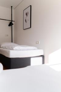 Letto o letti in una camera di homy Bludenz Alpine Panorama