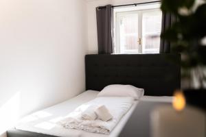 Letto o letti in una camera di homy Bludenz Alpine Panorama