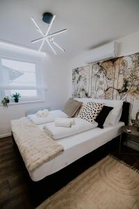Posteľ alebo postele v izbe v ubytovaní Maison de Luxe