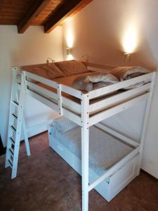 Postel nebo postele na pokoji v ubytování Villa Madi
