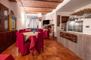 TV a/nebo společenská místnost v ubytování Agriturismo Meriggio