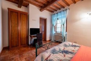 Postel nebo postele na pokoji v ubytování Agriturismo Meriggio