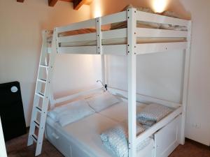 Postel nebo postele na pokoji v ubytování Villa Madi