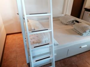 Postel nebo postele na pokoji v ubytování Villa Madi