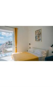 A bed or beds in a room at La Pigolina