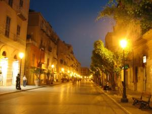 an empty city street at night with street lights at Case Vacanze Ancora in Porto Empedocle
