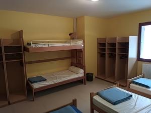 Ένα ή περισσότερα κρεβάτια σε δωμάτιο στο Chalet Jean Macé