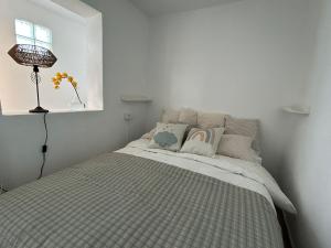 Postel nebo postele na pokoji v ubytování Casa Julián