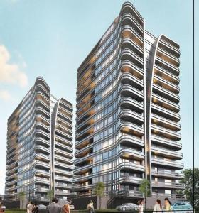 two tall buildings with people walking in front of them at Apartament GJ PLAZA II in Kielce