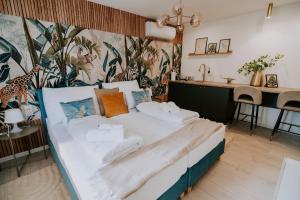 Posteľ alebo postele v izbe v ubytovaní Maison de Luxe