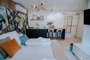 Posteľ alebo postele v izbe v ubytovaní Maison de Luxe