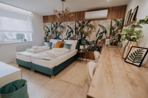 Posteľ alebo postele v izbe v ubytovaní Maison de Luxe