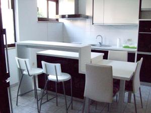 Kuchyňa alebo kuchynka v ubytovaní Apartment Monfiorenzo 11