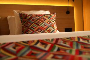 Letto o letti in una camera di Hotel-Restaurant Stand'Inn