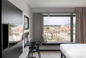 Postel nebo postele na pokoji v ubytování ibis Styles Genève Carouge