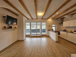 Kuchyň nebo kuchyňský kout v ubytování Gruz Holiday Hideaway