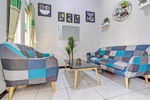 Posezení v ubytování SPOT ON 92012 Homestay Grand Mahkota Permai Syariah