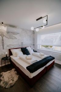 Posteľ alebo postele v izbe v ubytovaní Maison de Luxe
