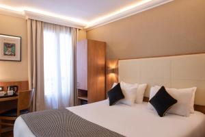 Postel nebo postele na pokoji v ubytování Hotel Cactus