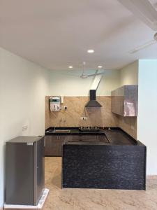 Η κουζίνα ή μικρή κουζίνα στο Almora Farm