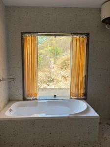 Φωτογραφία από το άλμπουμ του Almora Farm στο Ουνταϊπούρ