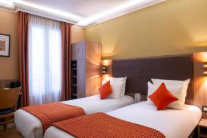 Postel nebo postele na pokoji v ubytování Hotel Cactus