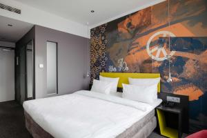 Postel nebo postele na pokoji v ubytování Hotel Berlin, Berlin, a member of Radisson Individuals