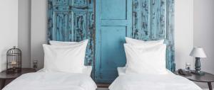 Ein Bett oder Betten in einem Zimmer der Unterkunft Hotel Berlin, Berlin, a member of Radisson Individuals