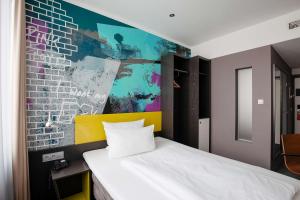 Ein Bett oder Betten in einem Zimmer der Unterkunft Hotel Berlin, Berlin, a member of Radisson Individuals
