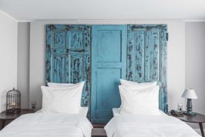 Ein Bett oder Betten in einem Zimmer der Unterkunft Hotel Berlin, Berlin, a member of Radisson Individuals