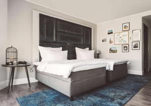 Ein Bett oder Betten in einem Zimmer der Unterkunft Hotel Berlin, Berlin, a member of Radisson Individuals