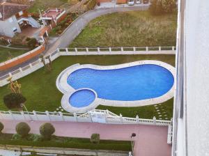 an overhead view of a swimming pool in a yard at Torre Rocamar in Baiona