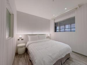 Letto o letti in una camera di 在家行旅 南西館
