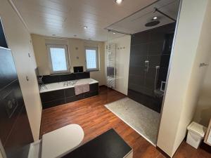 Koupelna v ubytování Ferienhaus Rennsteigidylle + 8 fotografií