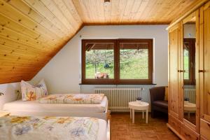Postel nebo postele na pokoji v ubytování Hugenhof