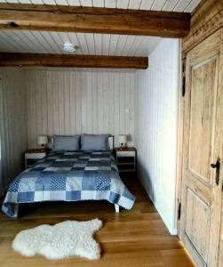 Postel nebo postele na pokoji v ubytování Rönne Majutus