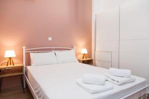 Posteľ alebo postele v izbe v ubytovaní Beautiful new apartment in Petralona