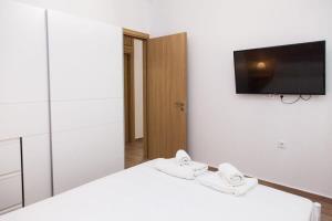 Posteľ alebo postele v izbe v ubytovaní Beautiful new apartment in Petralona