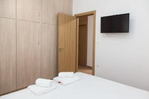 Posteľ alebo postele v izbe v ubytovaní Beautiful new apartment in Petralona