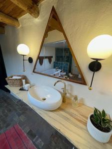 a bathroom with a sink and a mirror at Spacious Stylish Niji Suite in Santa Fe