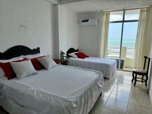 Postel nebo postele na pokoji v ubytování HOTEL PAL-MAR