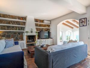 A television and/or entertainment centre at Zen Villa by Hello Homes Sitges