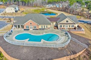 an aerial view of a house with a large swimming pool at The Villas Buckingham 10 mins to RDU Airport Duke Downtown in Durham